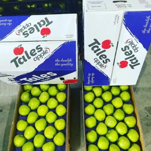 two boxes of green apples